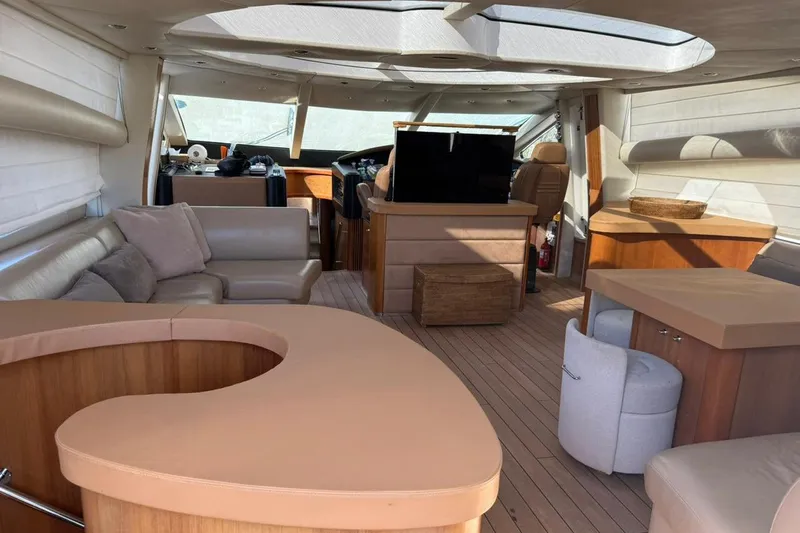  Yacht Photos Pics Luxurious interior of a 2006 Sunseeker Predator 82 yacht with elegant seating and modern design.
