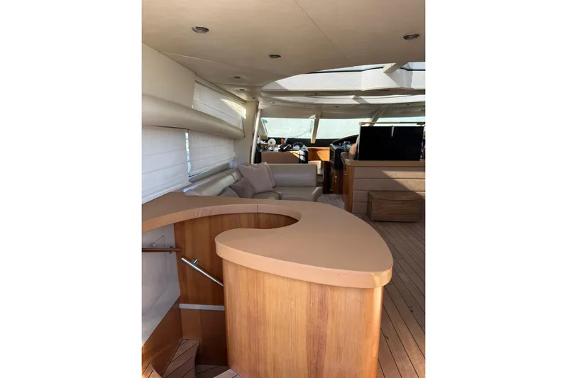  Yacht Photos Pics Luxurious interior of 2006 Sunseeker Predator 82 yacht with elegant wood finishes.