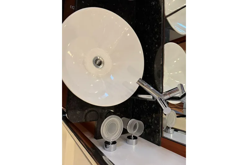  Yacht Photos Pics Luxurious bathroom sink with modern faucet on Sunseeker Predator 82 yacht, 2006 model.