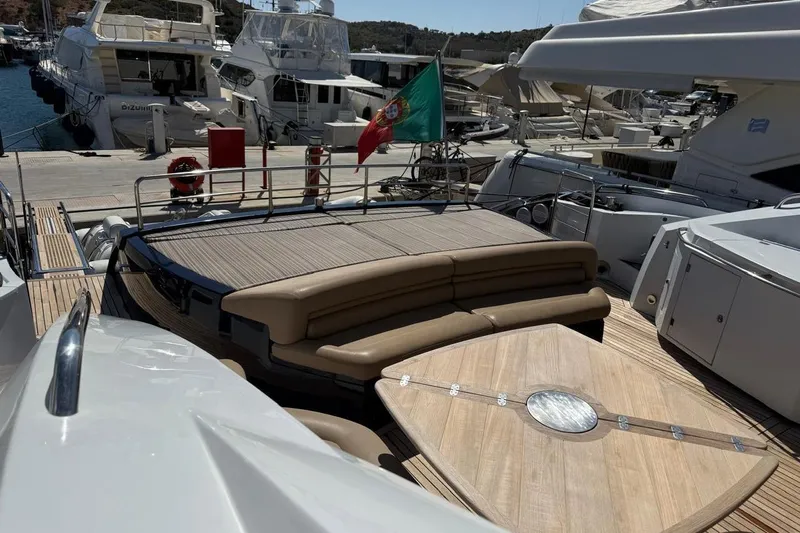 Yacht Photos Pics Luxury Sunseeker Predator 82 yacht docked, featuring spacious deck and elegant seating, 2006 model.