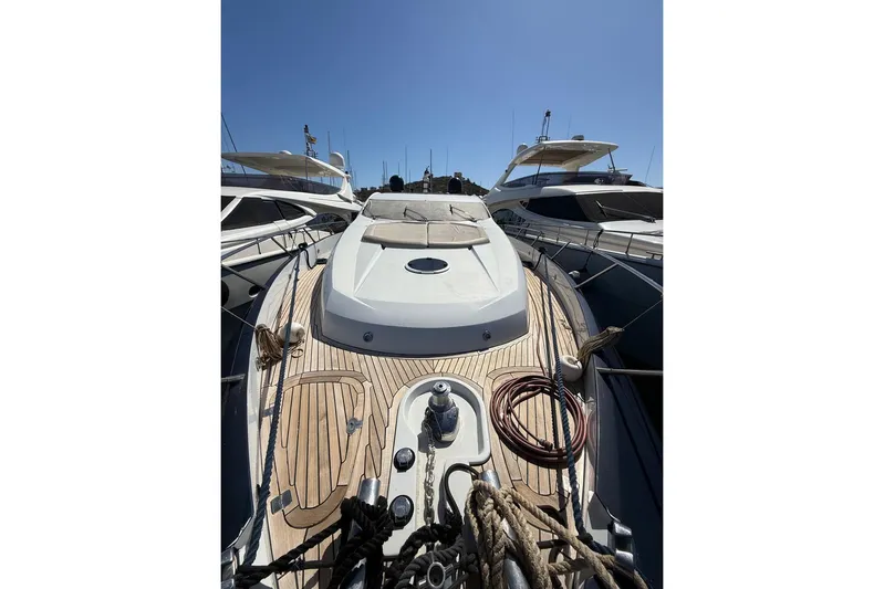  Yacht Photos Pics 2006 Sunseeker Predator 82 yacht with sleek deck design and luxurious features.