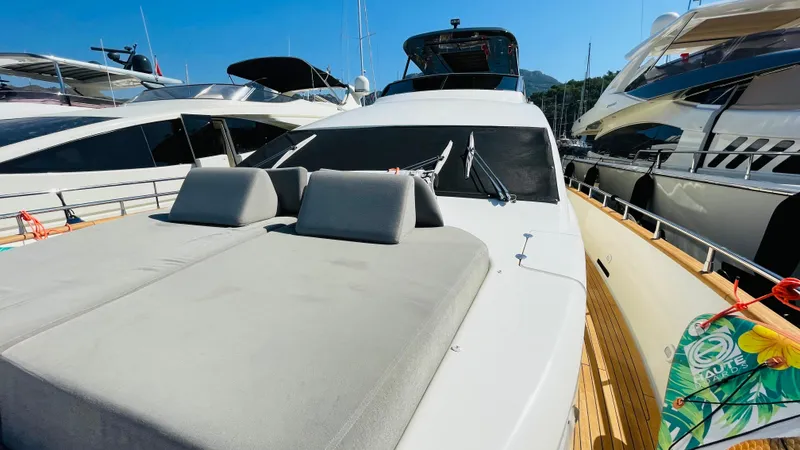  Yacht Photos Pics Luxury Canados 76 yacht, 2016 model, docked with sunbathing area and sleek design.