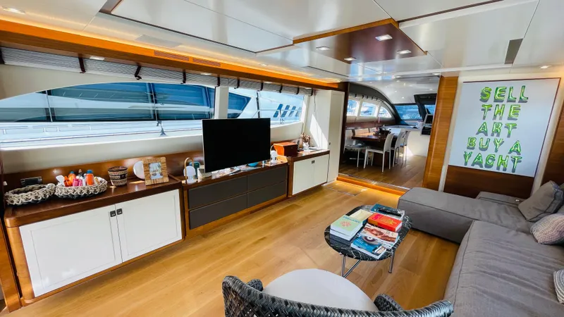  Yacht Photos Pics Luxurious interior of 2016 Canados 76 yacht with modern decor and comfortable seating.