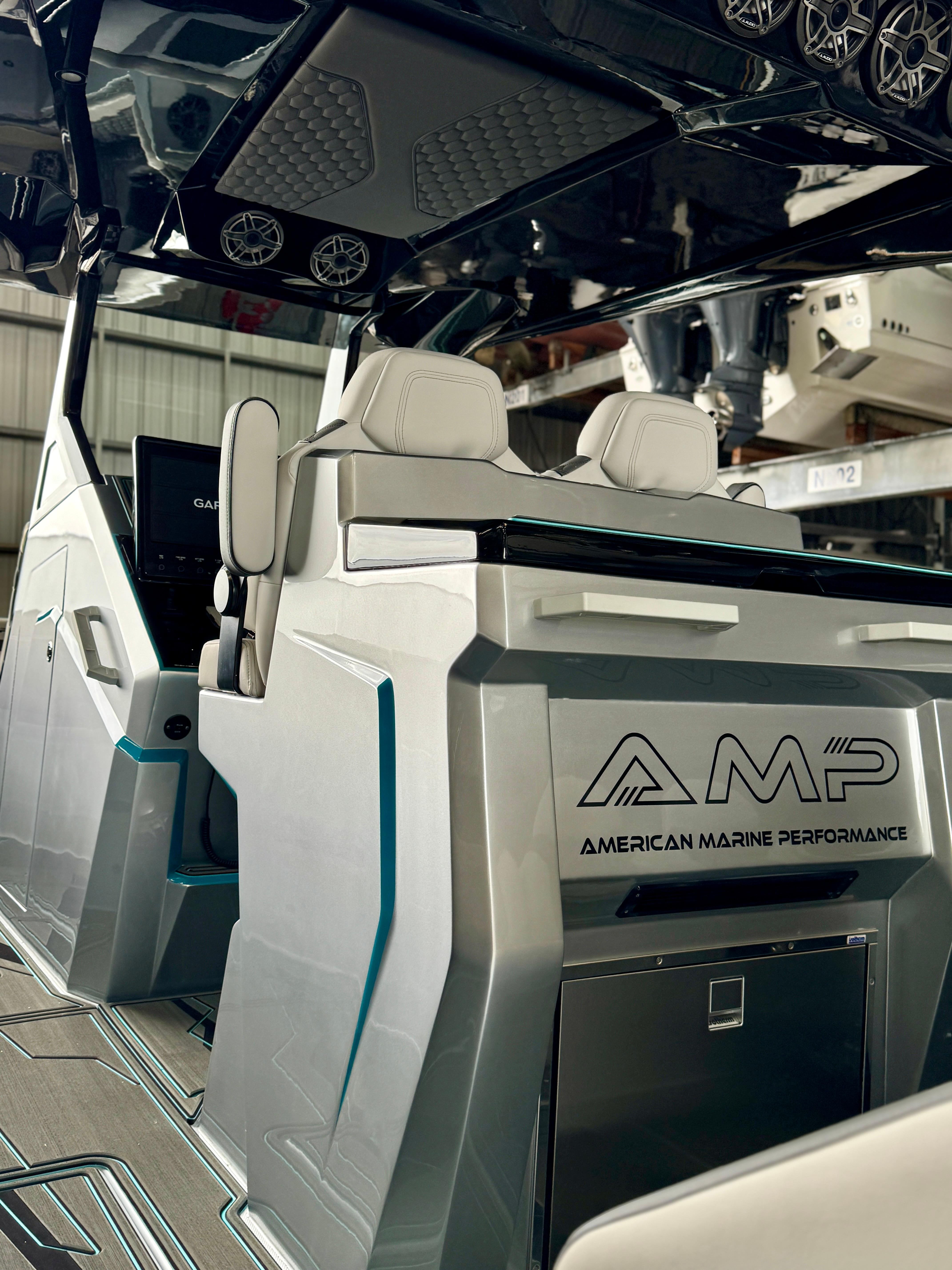 2024 AMP 333 boat interior with modern seating and sleek design.
