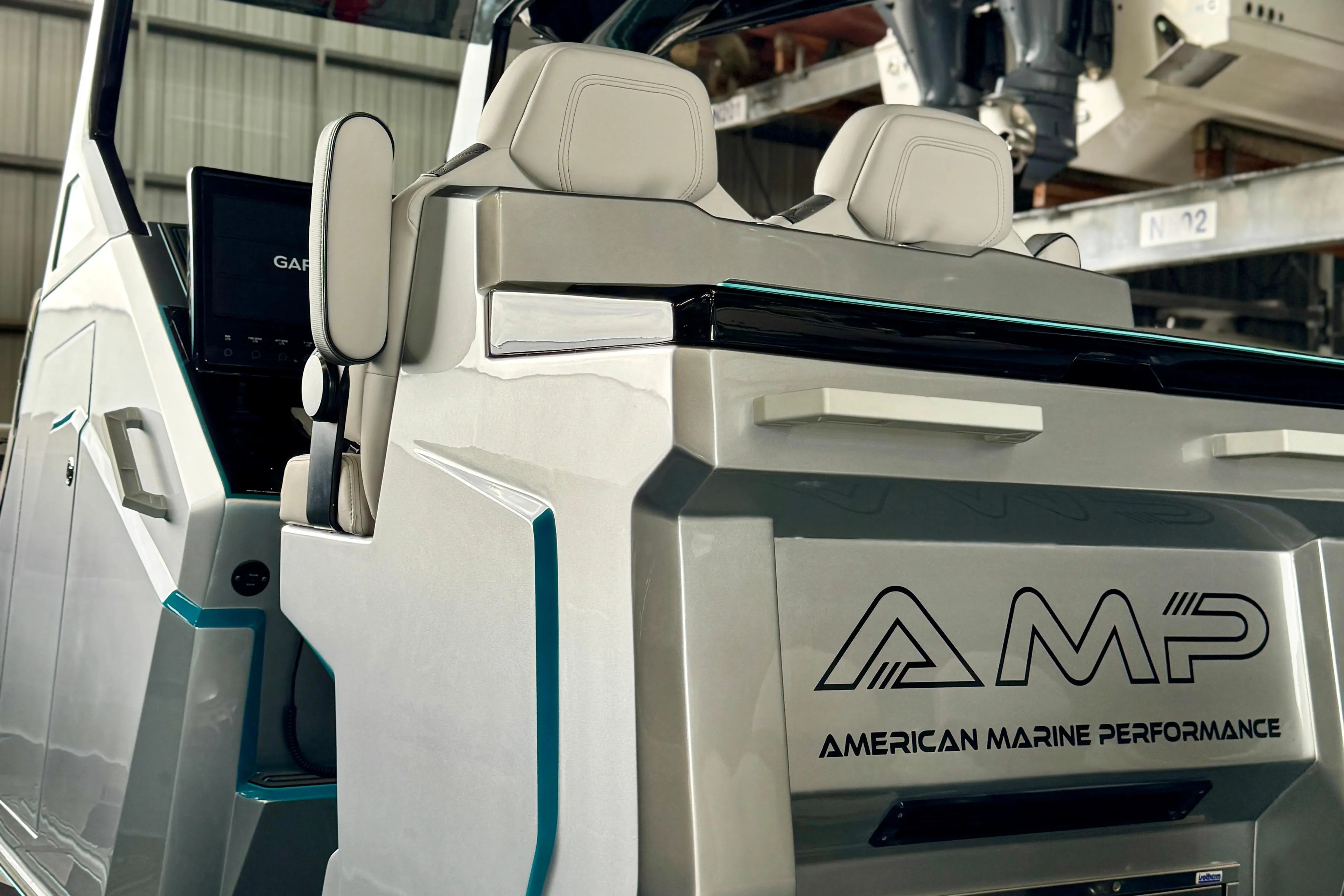 2024 AMP 333 boat interior with modern seating and sleek design.