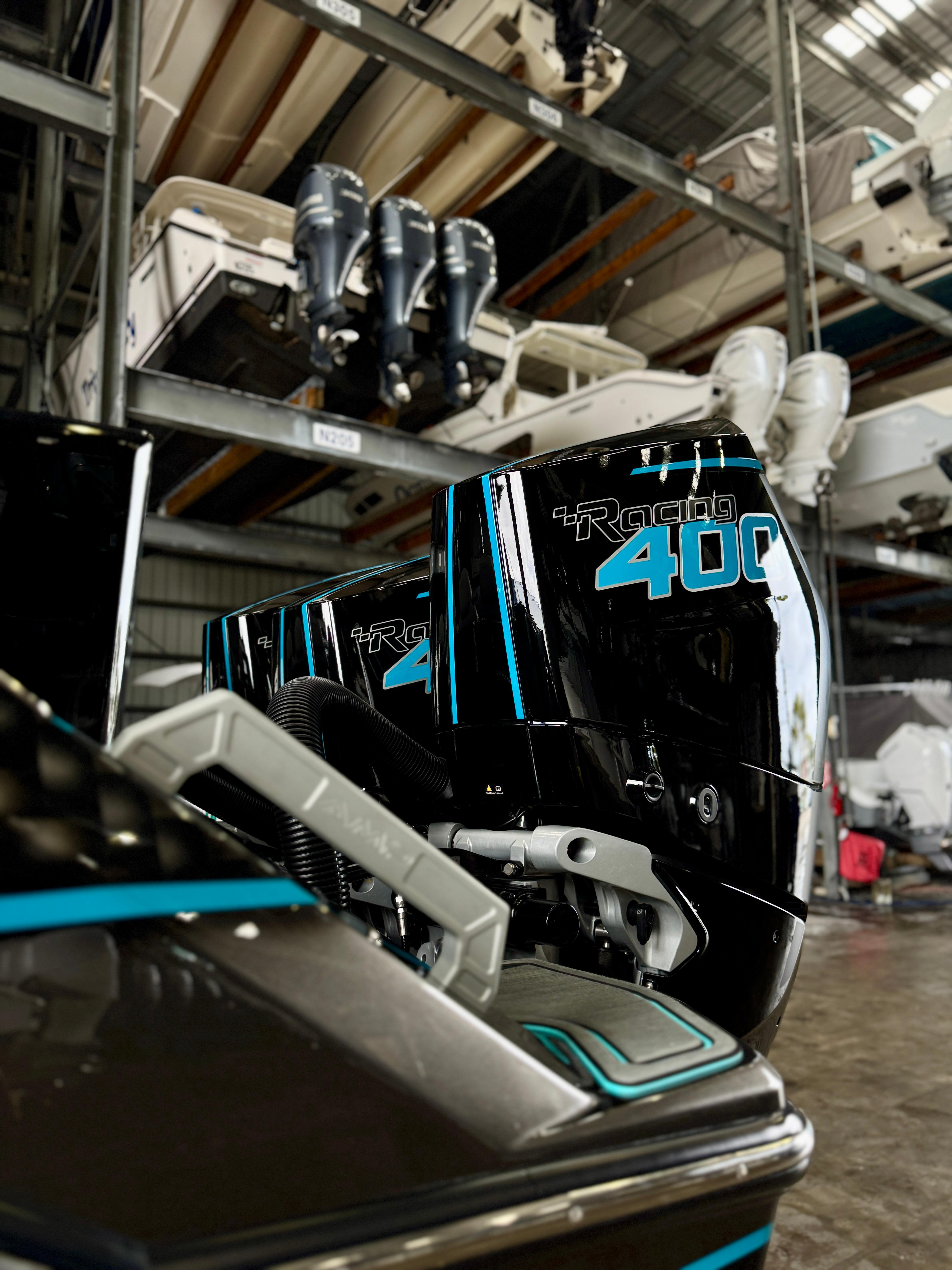 AMP 333 outboard motors in storage, showcasing sleek design and advanced technology, 2024 model.