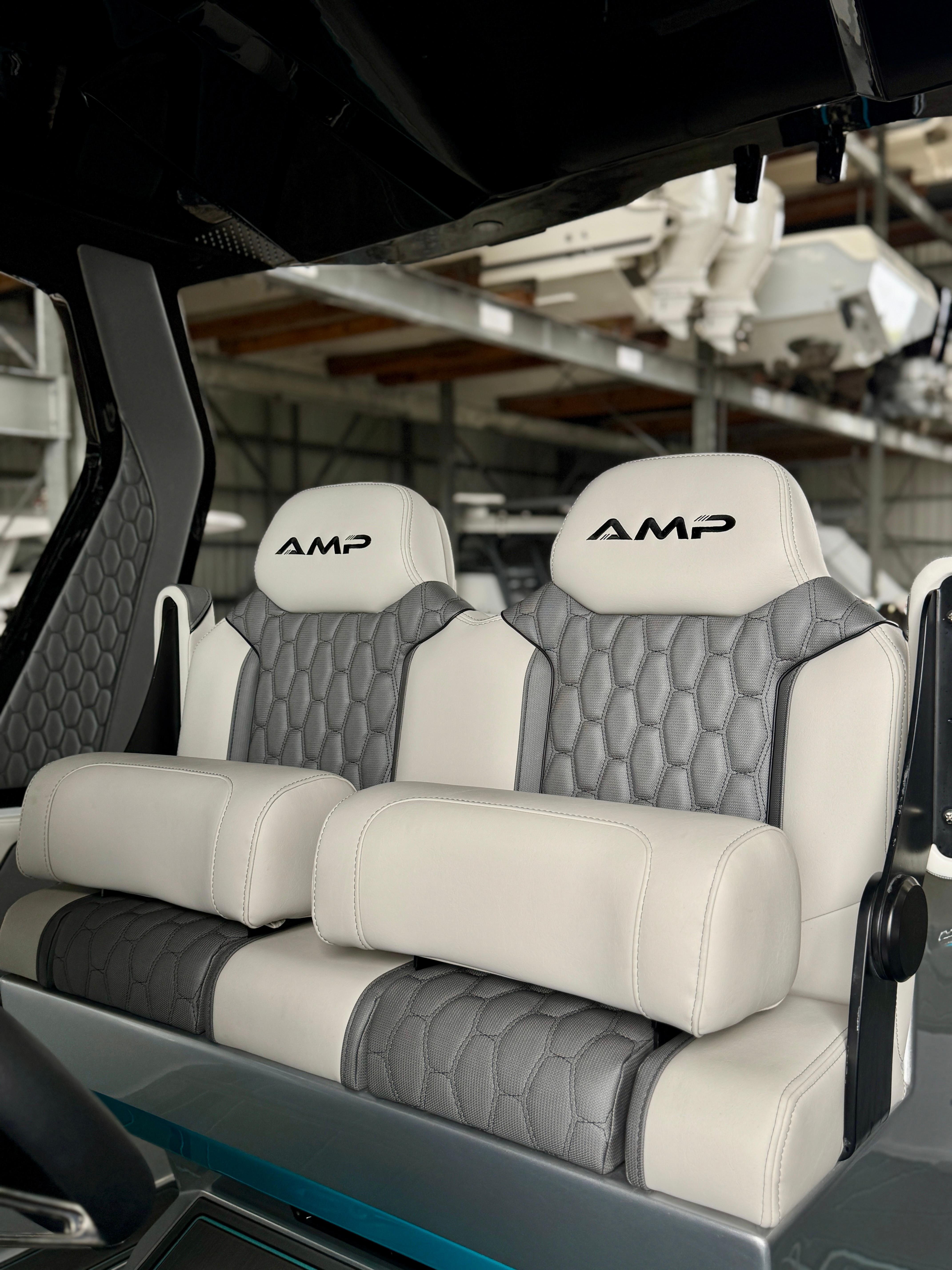 Luxurious AMP 333 boat seats, 2024 model, featuring elegant gray and white upholstery.