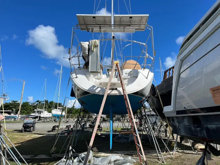 4 Estrellas Yacht Photos Pics Notice the Solar Panels and folded pasarell for Med mooring.