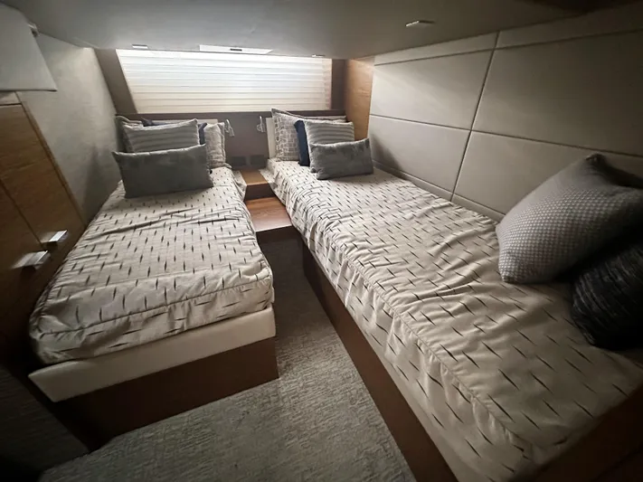 Finally Yacht Photos Pics 2021 Tiara Yachts F44 Flybridge cabin with twin beds and modern decor.