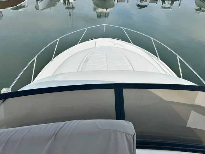 Finally Yacht Photos Pics 2021 Tiara Yachts F44 Flybridge bow view at marina.