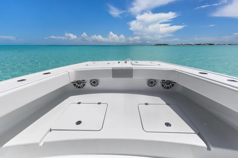 Reel Deal Yacht Photos Pics 2023 Freeman 42 LR boat deck with ocean view and clear blue skies.