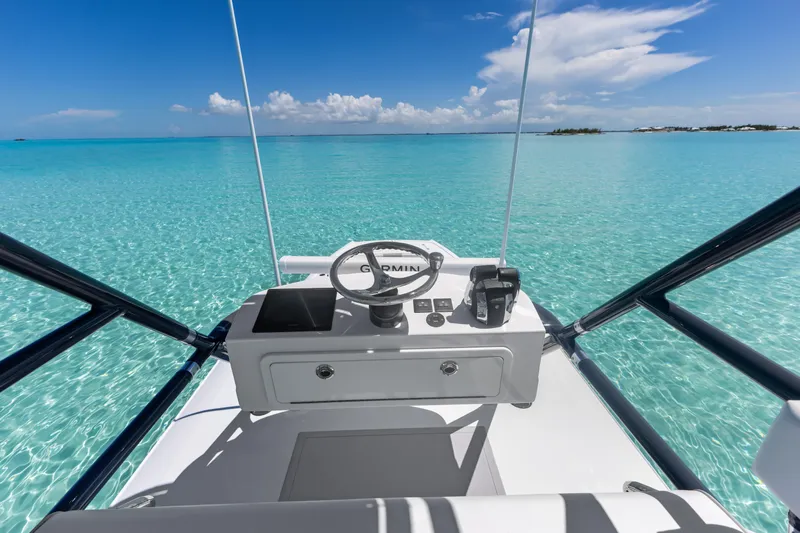 Reel Deal Yacht Photos Pics Freeman 42 LR boat dashboard overlooking clear turquoise waters, 2023 model.