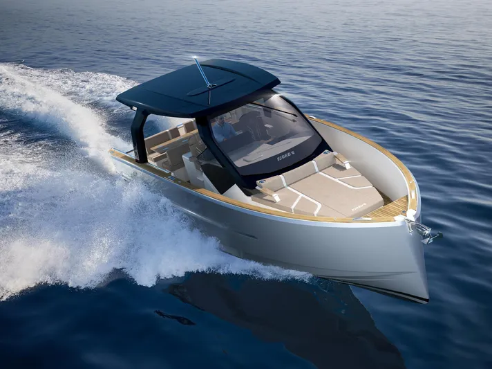  Yacht Photos Pics 2024 Fjord 39XP luxury yacht cruising on open water, showcasing sleek design and modern features.