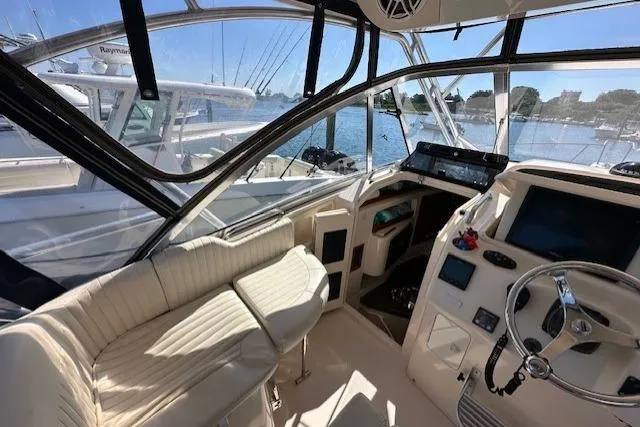  Yacht Photos Pics 2008 Grady-White Express 330 boat interior with helm, seating, and navigation equipment.