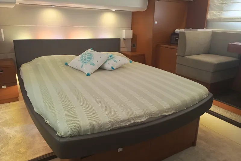Lt Yacht Photos Pics Luxurious bedroom interior of 2016 Prestige 550 yacht with modern decor and ambient lighting.