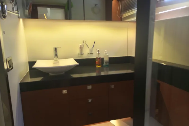 Lt Yacht Photos Pics Modern bathroom vanity with vessel sink and toiletries on Prestige 550 yacht, 2016 model.