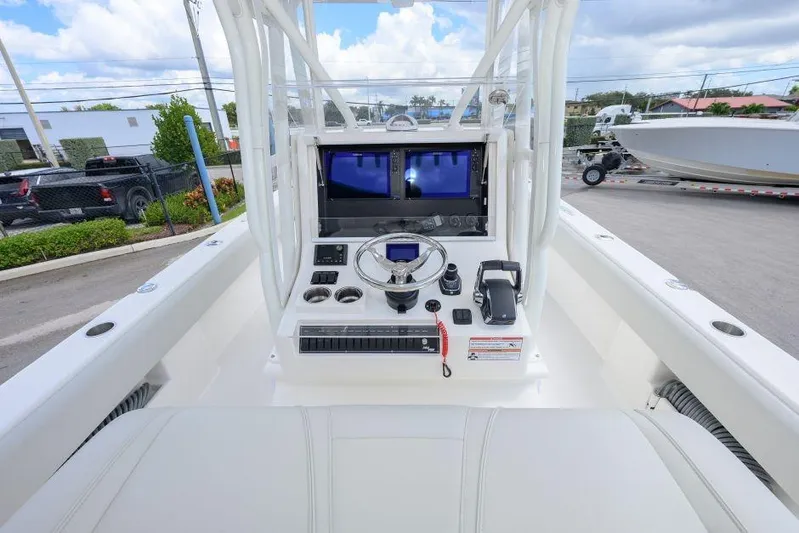  Yacht Photos Pics 2025 SeaVee 320B boat console with modern navigation and control systems.