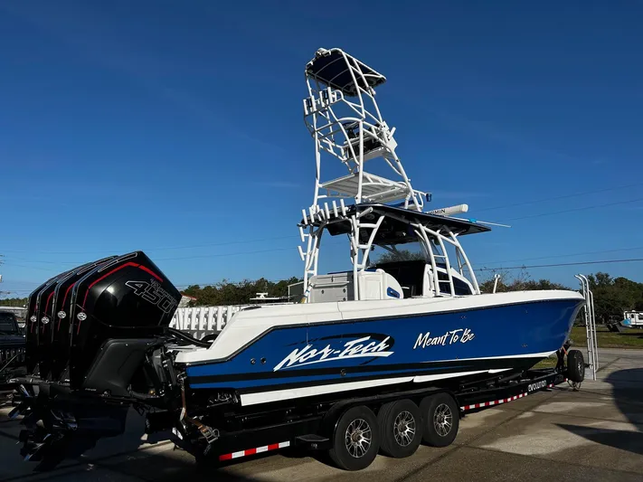  Yacht Photos Pics 2022 Nor-Tech 392 Superfish boat with triple outboard engines on trailer.