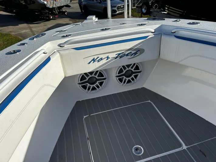  Yacht Photos Pics 2022 Nor-Tech 392 Superfish boat interior with speakers and logo.
