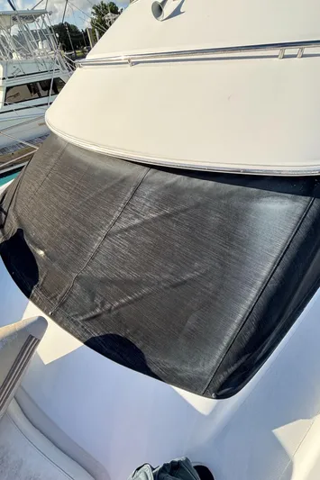 Busy Living Yacht Photos Pics 2001 Carver 396 Aft Cabin MY boat with covered windshield in marina.