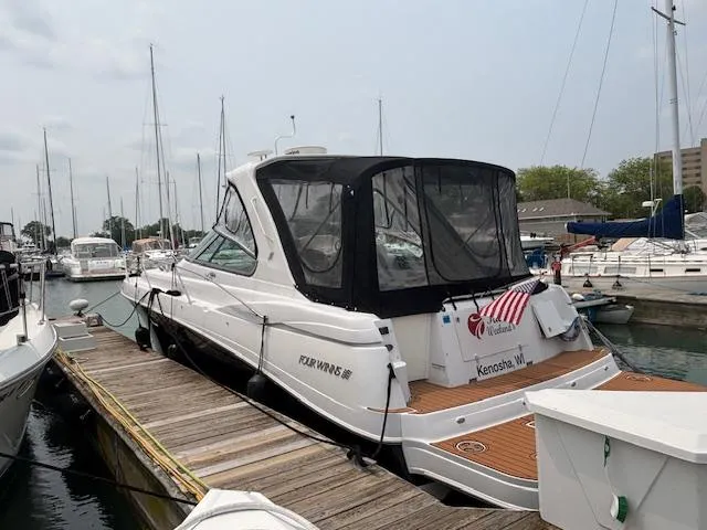  Yacht Photos Pics 2007 Four Winns 378 Vista yacht docked at marina, Kenosha, WI, with American flag.