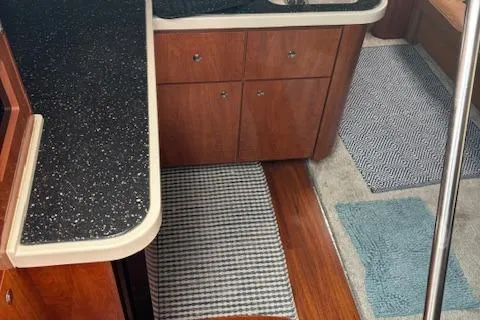  Yacht Photos Pics 2007 Four Winns 378 Vista interior with wood flooring and modern cabinetry.