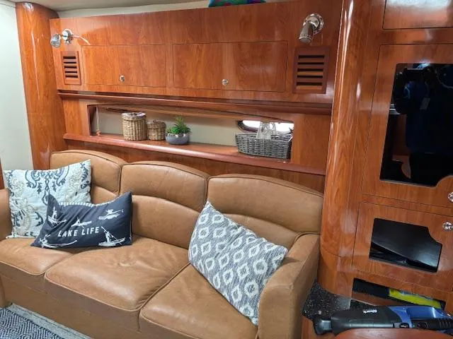  Yacht Photos Pics Interior of 2007 Four Winns 378 Vista yacht with leather seating and wooden cabinetry.