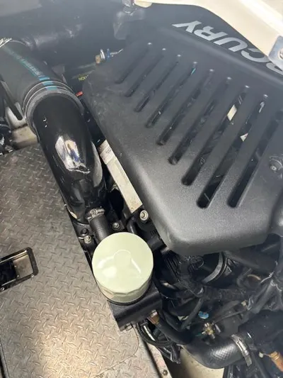  Yacht Photos Pics Engine compartment of a 2007 Four Winns 378 Vista boat, featuring a Mercury engine.