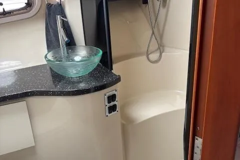  Yacht Photos Pics 2007 Four Winns 378 Vista bathroom with glass sink and shower.