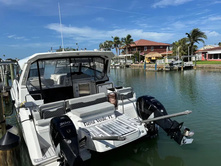 Namaste Yacht Photos Pics 2018 Aquila 36 Sport boat docked in a scenic waterfront location, Tierra Verde, FL.