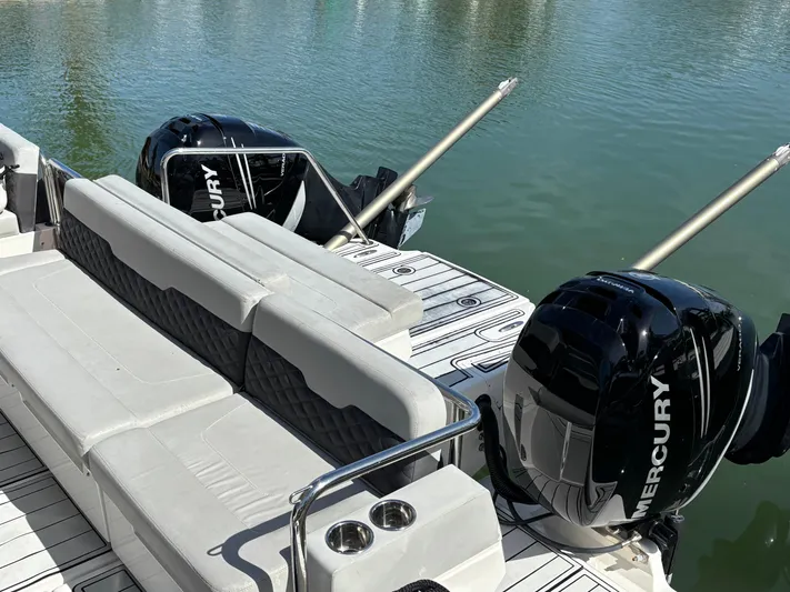 Namaste Yacht Photos Pics 2018 Aquila 36 Sport boat with twin Mercury engines and spacious seating.