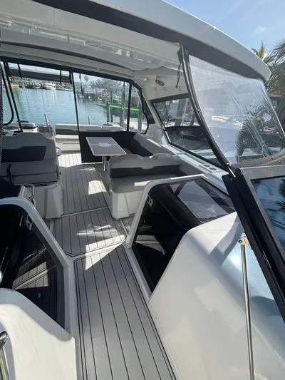 Namaste Yacht Photos Pics Interior view of 2018 Aquila 36 Sport yacht with spacious seating and sleek design.
