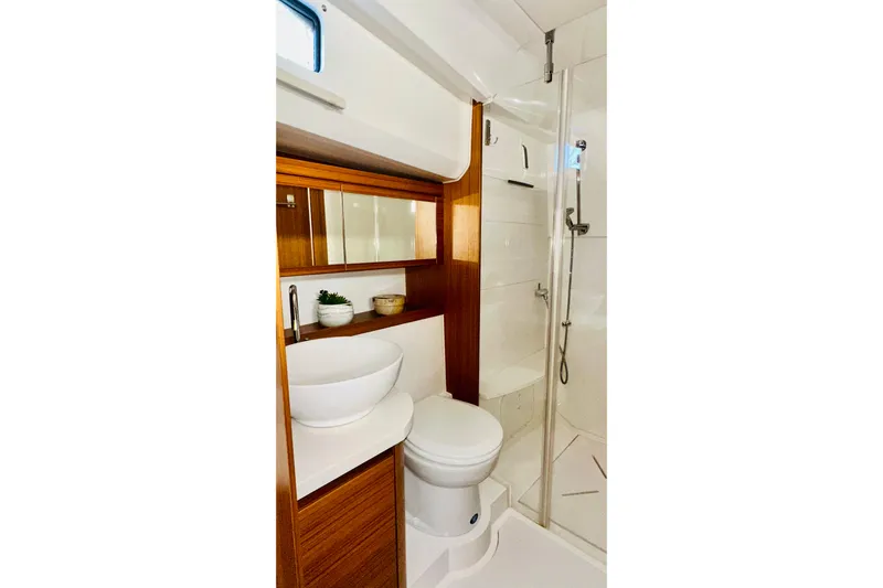 Least Expensive 39 Hybrid In The Country Yacht Photos Pics Modern bathroom in 2021 Greenline 39 Hybrid yacht with wood accents and glass shower.