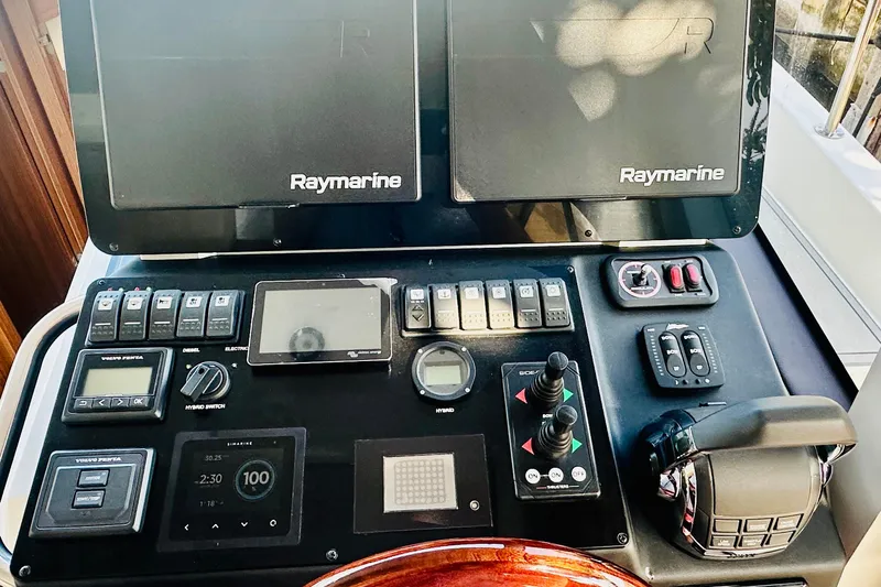 Least Expensive 39 Hybrid In The Country Yacht Photos Pics Control panel of 2021 Greenline 39 Hybrid boat with Raymarine navigation systems.