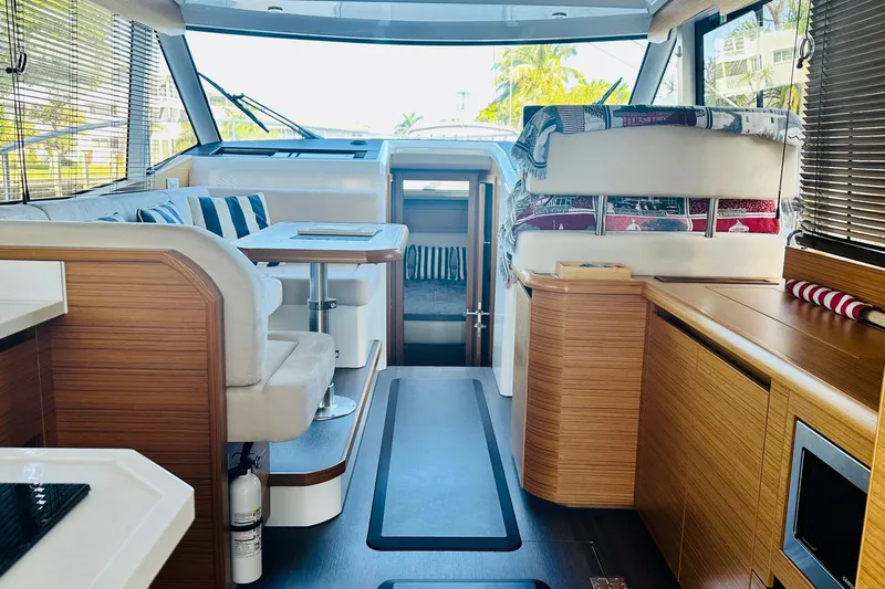 Least Expensive 39 Hybrid In The Country Yacht Photos Pics Interior of 2021 Greenline 39 Hybrid yacht, featuring modern seating and wooden finishes.