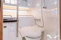Modern bathroom in 2023 Nimbus W11 boat with shower and toilet.