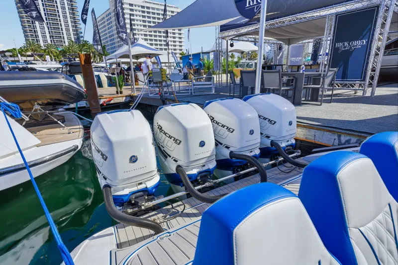  Yacht Photos Pics 2019 Midnight Express 43 Open boat with powerful outboard engines at a marina display.