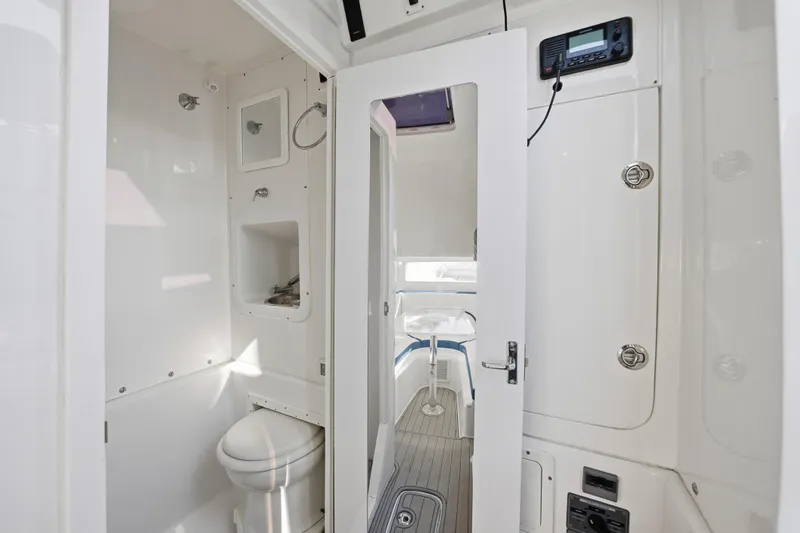  Yacht Photos Pics Interior of 2019 Midnight Express 43 Open boat, featuring a compact bathroom.