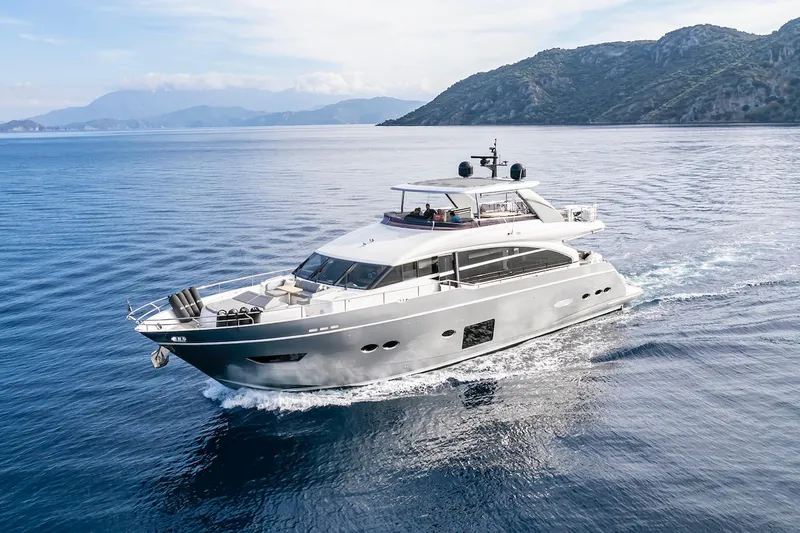 Lady Parisa Yacht Photos Pics Luxurious 2014 Princess 88 Motor Yacht cruising in scenic coastal waters.