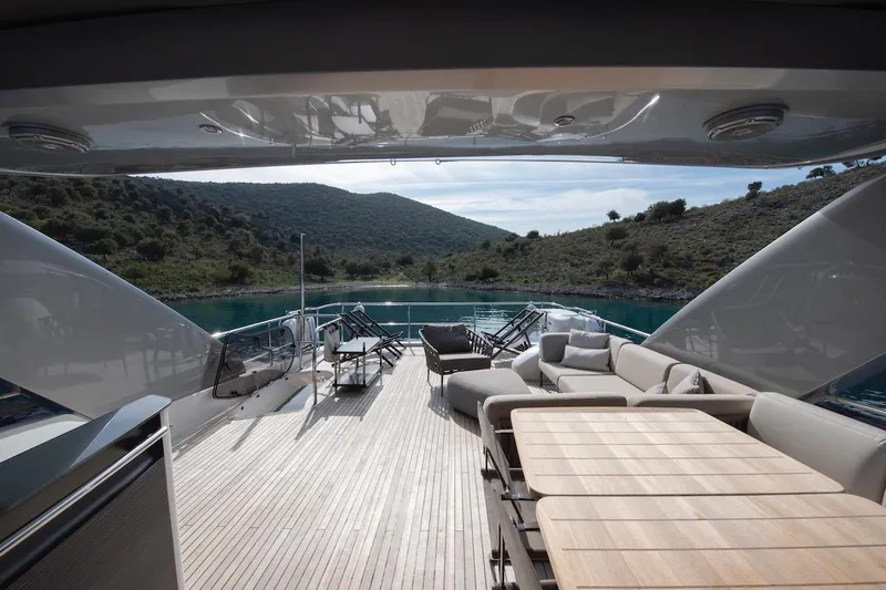 Lady Parisa Yacht Photos Pics Luxurious 2014 Princess 88 Motor Yacht deck with elegant seating and scenic water view.