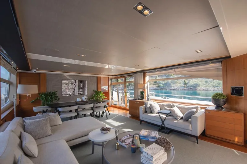 Lady Parisa Yacht Photos Pics Luxurious interior of 2014 Princess 88 Motor Yacht with elegant seating and scenic views.