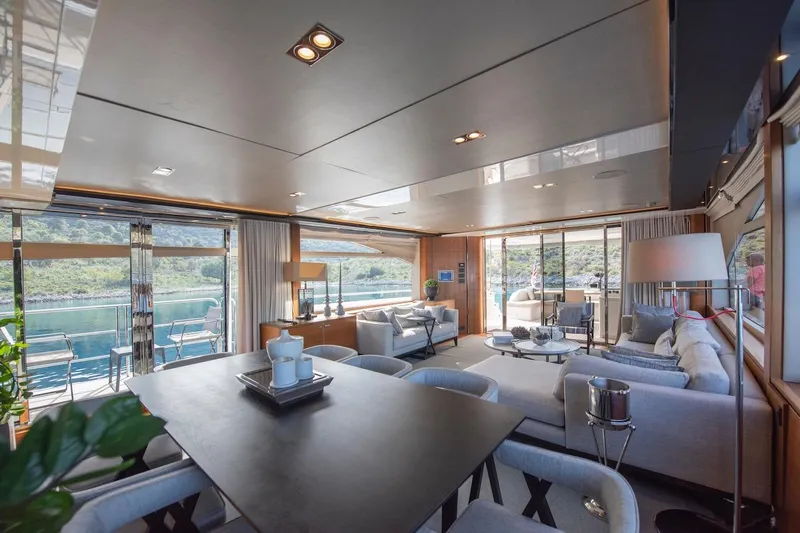 Lady Parisa Yacht Photos Pics Luxurious interior of 2014 Princess 88 Motor Yacht with elegant seating and scenic views.