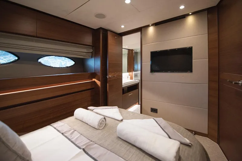 Lady Parisa Yacht Photos Pics Luxurious bedroom interior of 2014 Princess 88 Motor Yacht with modern amenities.