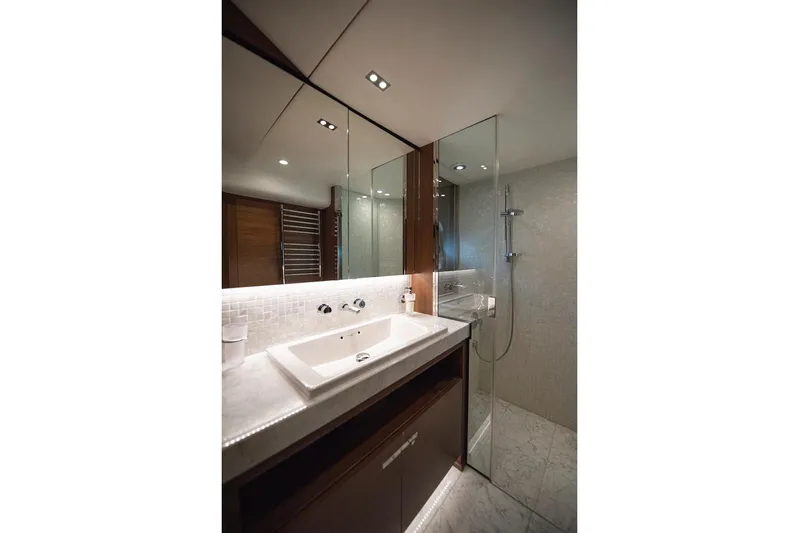Lady Parisa Yacht Photos Pics Luxurious bathroom in 2014 Princess 88 Motor Yacht with modern fixtures and elegant design.