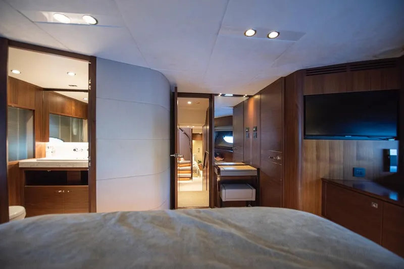 Lady Parisa Yacht Photos Pics Luxurious interior of 2014 Princess 88 Motor Yacht with modern wood finishes and elegant design.