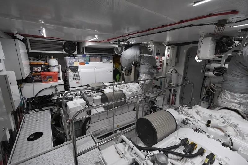 Lady Parisa Yacht Photos Pics Engine room of a 2014 Princess 88 Motor Yacht, showcasing machinery and equipment.