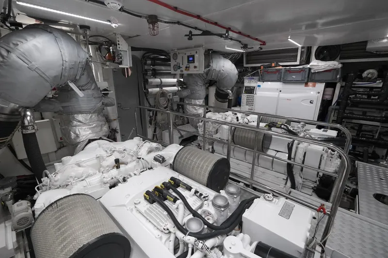 Lady Parisa Yacht Photos Pics Engine room of a 2014 Princess 88 Motor Yacht, featuring advanced machinery and equipment.