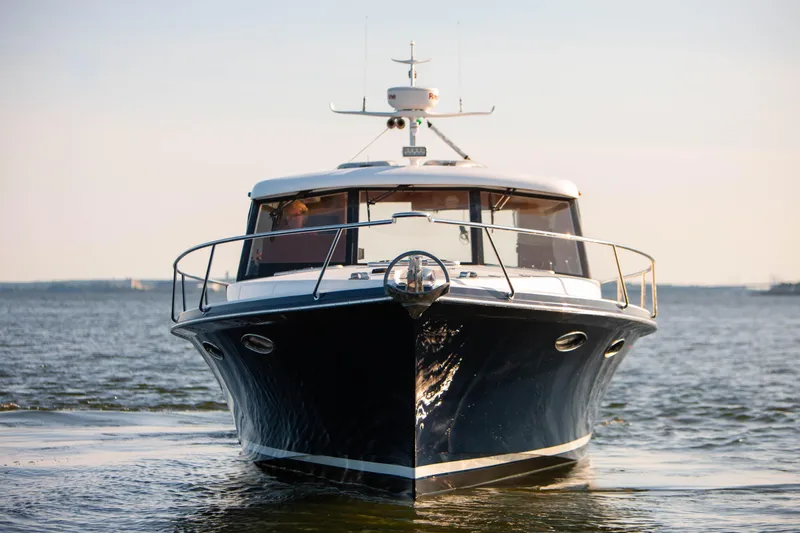  Yacht Photos Pics Front view of a 2018 Hylas M44 yacht on calm water.