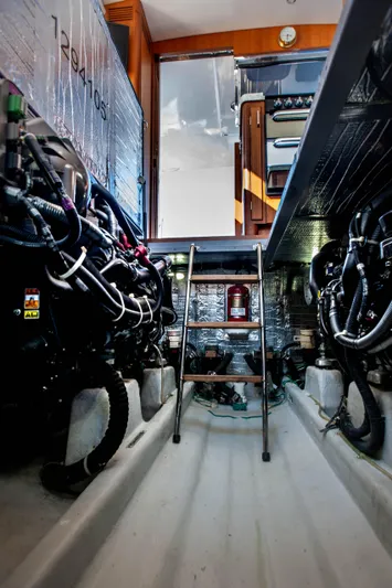  Yacht Photos Pics Engine room of 2018 Hylas M44 yacht with visible machinery and ladder.