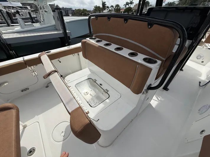  Yacht Photos Pics 2023 Sea Hunt Gamefish 30 boat interior with forward seating and storage compartments.